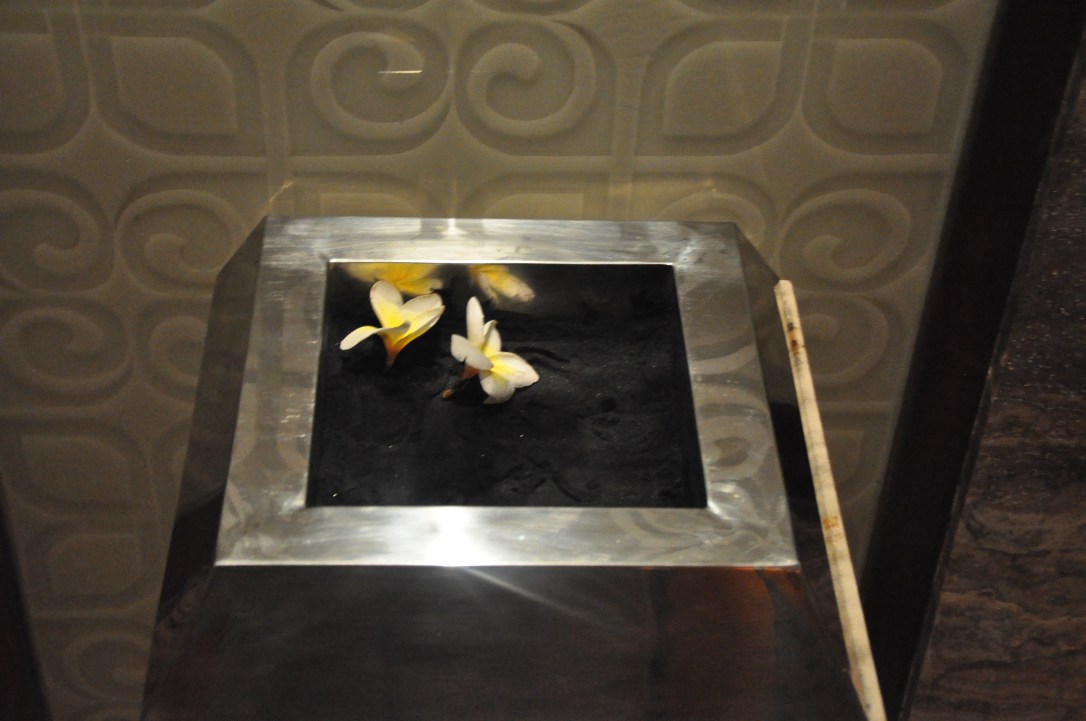 Even the ashtrays were lovely. The St. Regis seal was embossed in the black sand. 